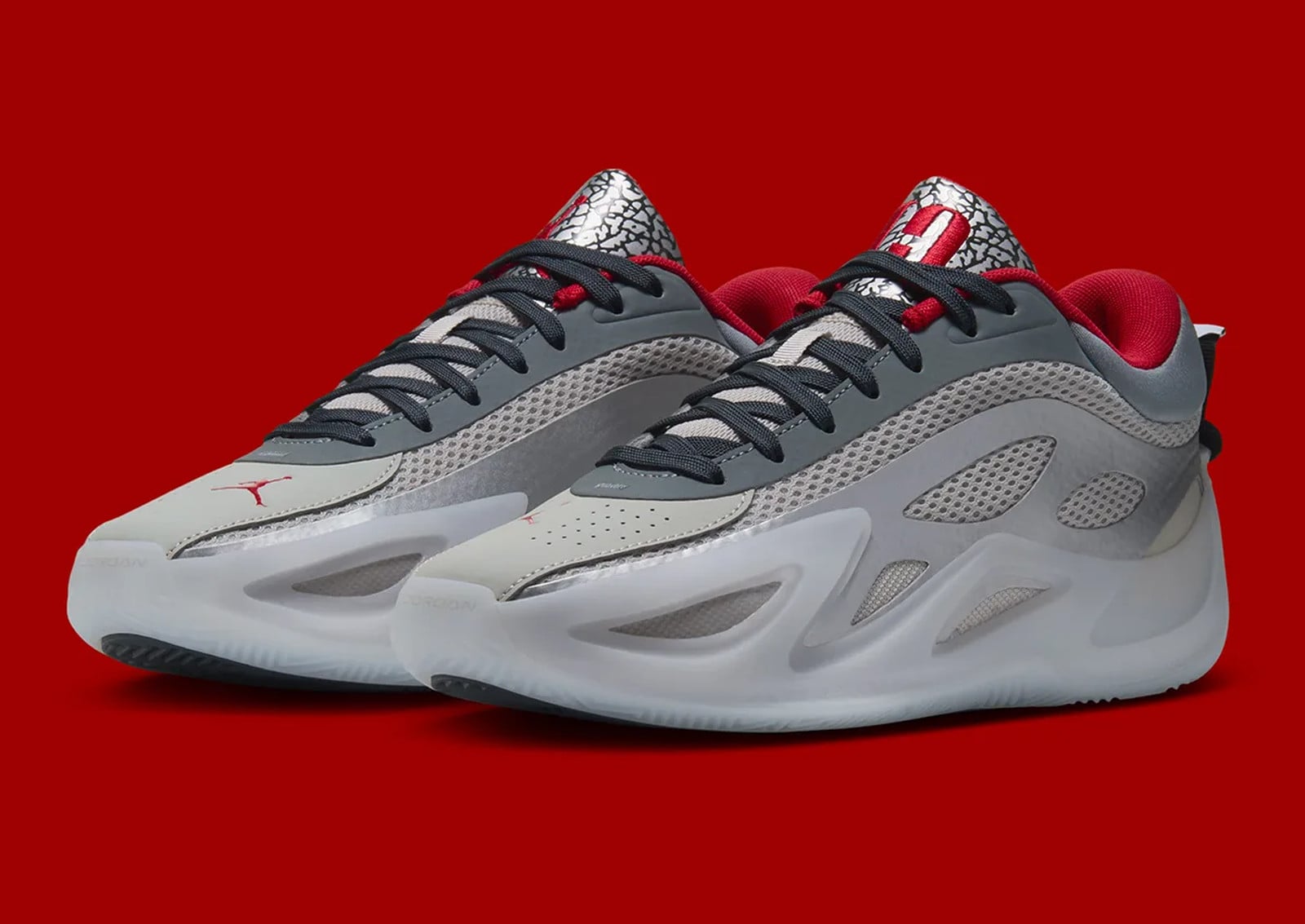 Front three-quarter pair with grey mesh, red lining and translucent soles, Jordan Heir Series 2 “Elephant Print”