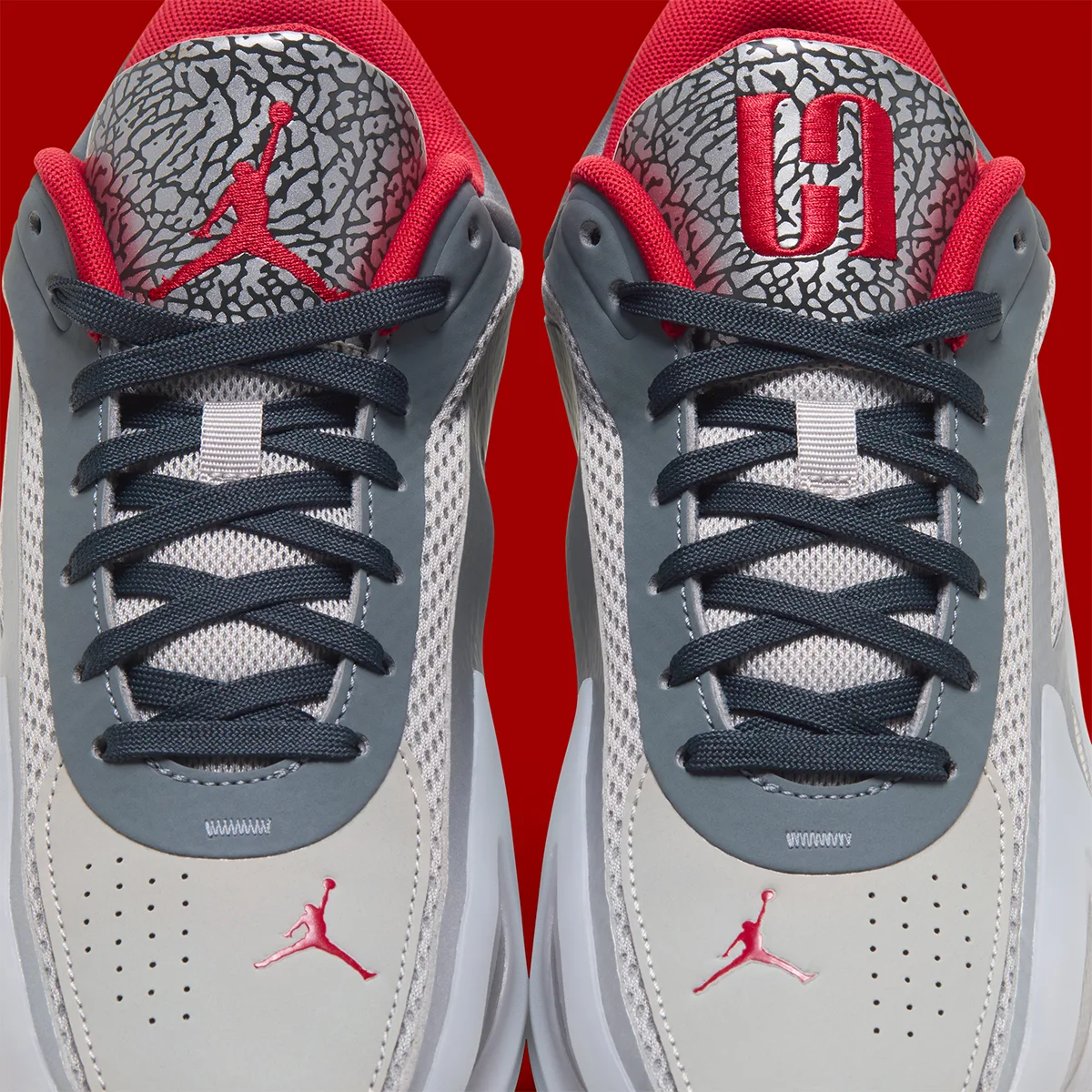 Tongue detail pair with elephant print and red Jumpman and monogram embroidery, Elephant Print
