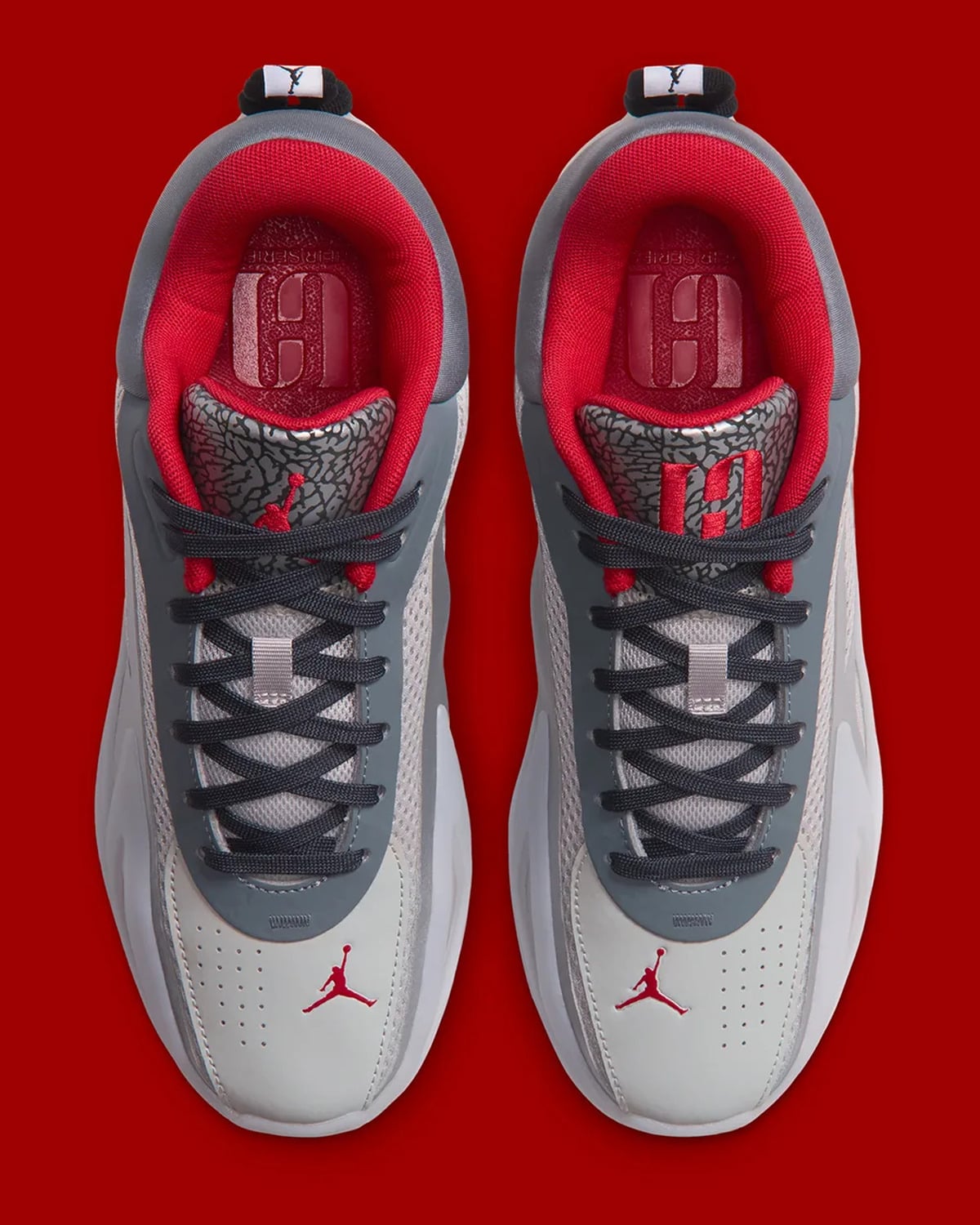 Top-down pair with red lining, dark laces and elephant-print tongues, Elephant Print