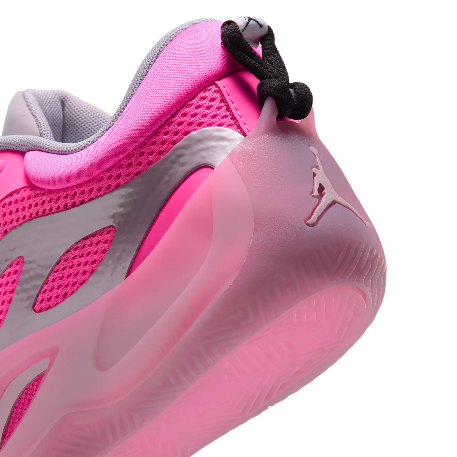 Heel detail, black knotted loop above a Jumpman logo on translucent pink heel, Pow Pink