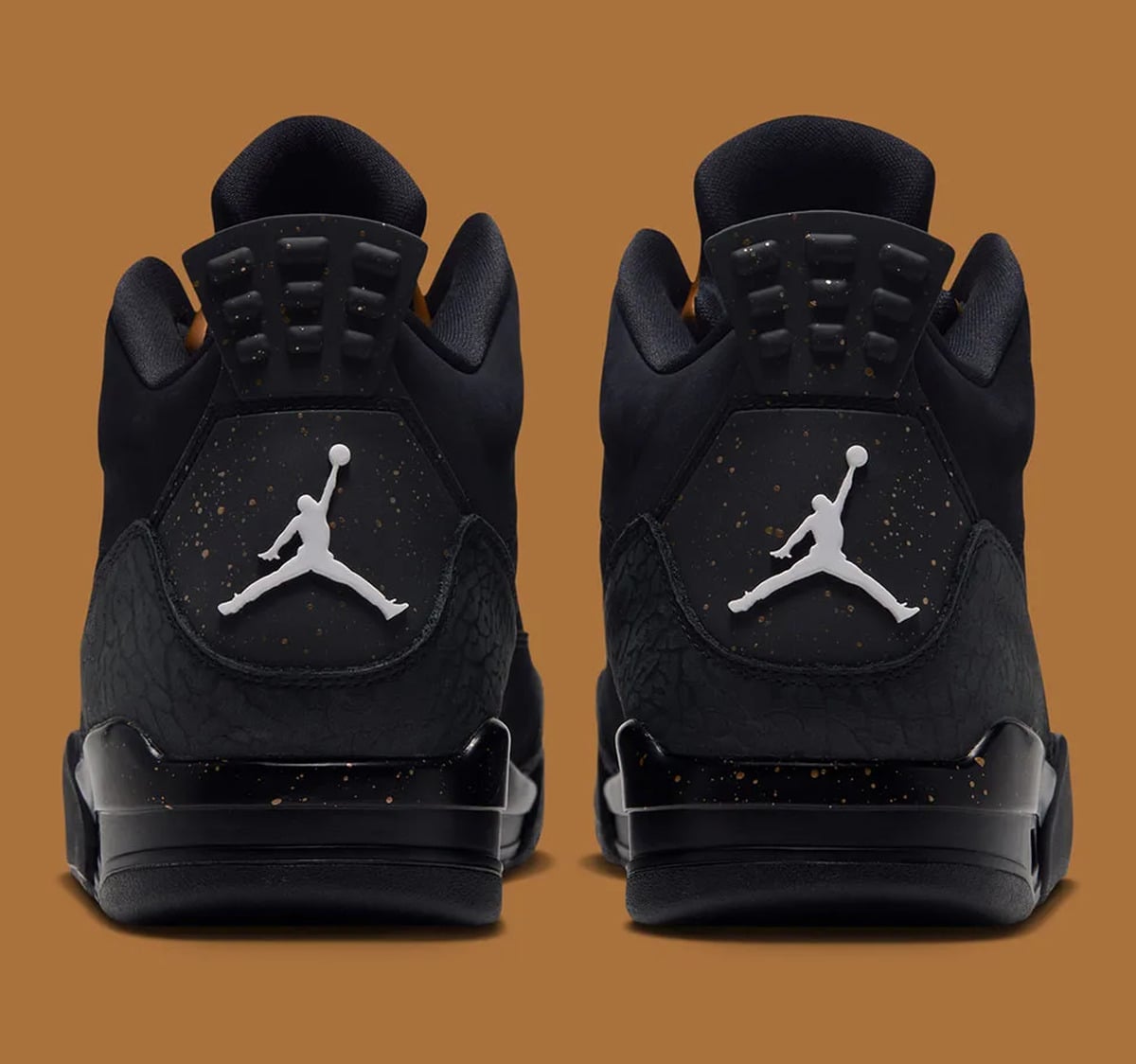 Heel view of pair, white Jumpman logos on gold-speckled black heel tabs, Gold Tongue