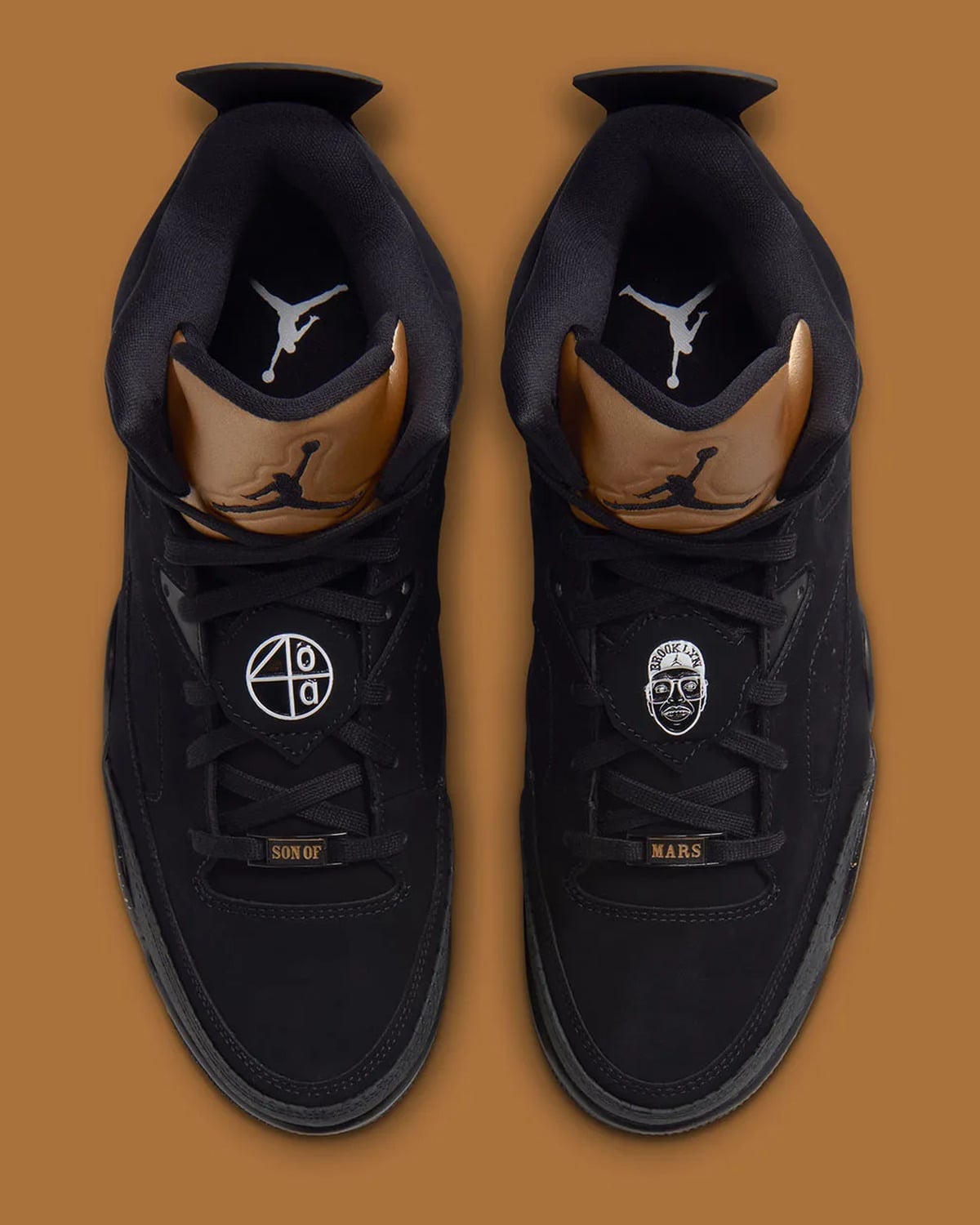 Top-down view of pair with gold Jumpman tongues, silver lace badges and Son of Mars lace tags, Gold Tongue