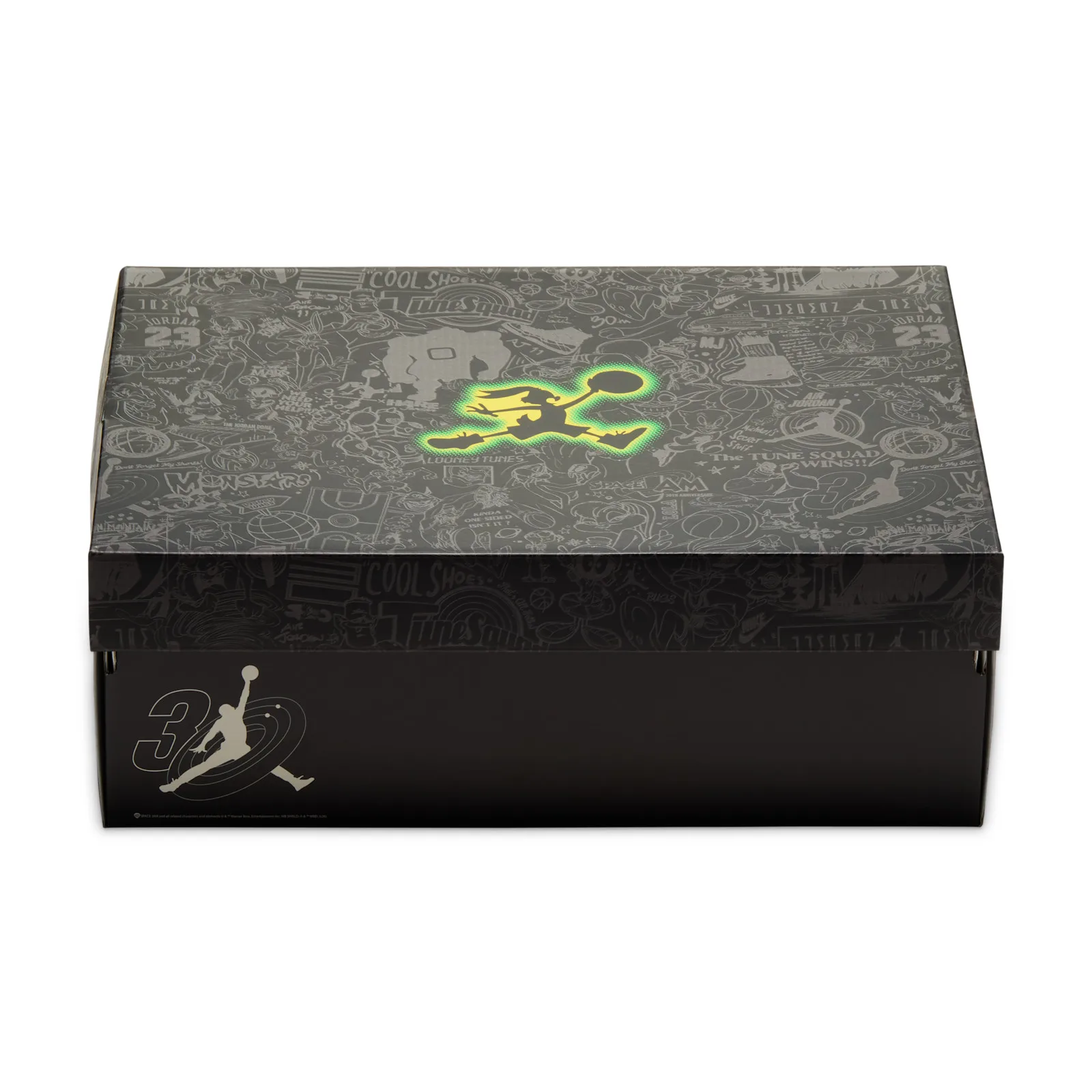 Closed black box lid with grey cartoon pattern and a glowing green and yellow Jumpman, Lunar Tunes