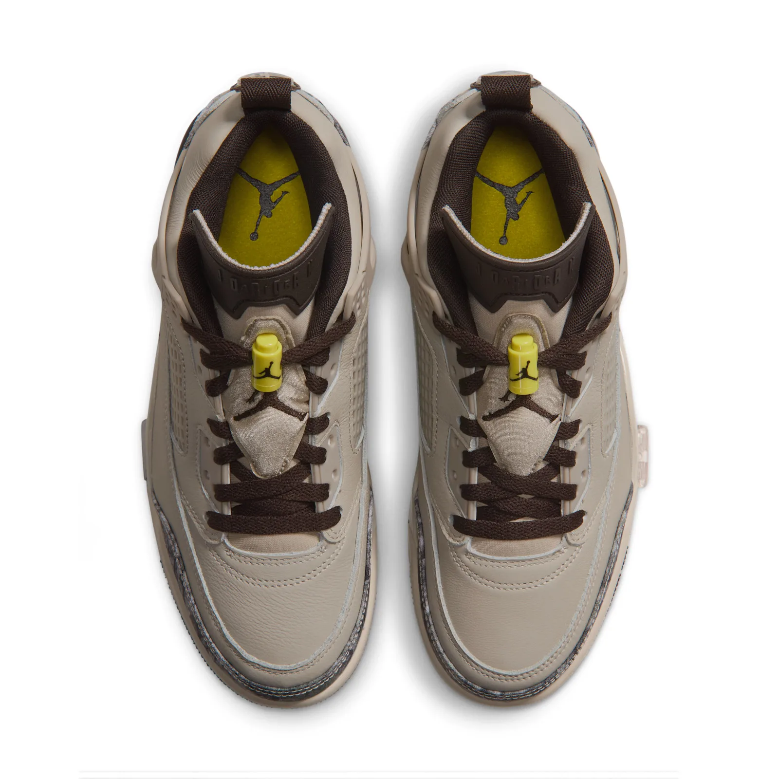 Top-down view of pair with yellow insoles, Jordan logos, brown laces and yellow toggles, Realtree Camo