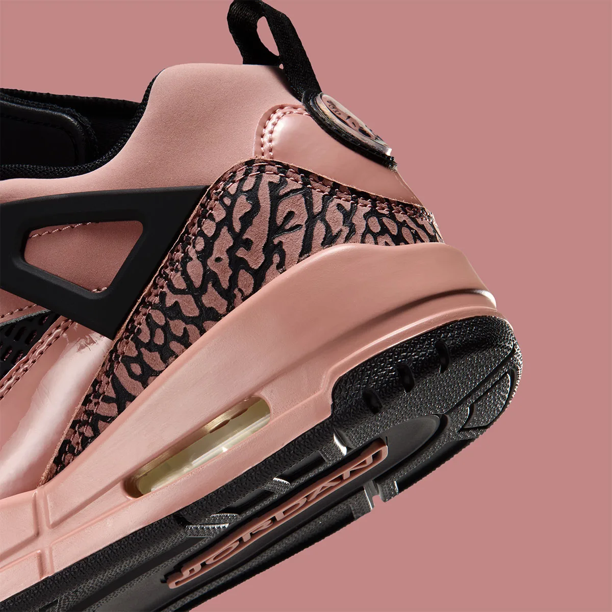 Heel detail with pink and black elephant print and visible Air window, Rust Pink