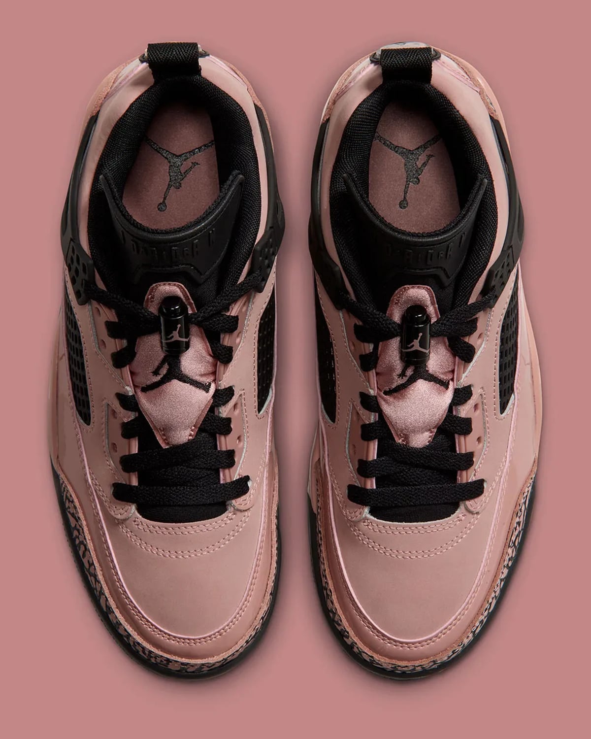 Top-down pair with black laces, pink tongue panels and Jumpman insoles, Rust Pink