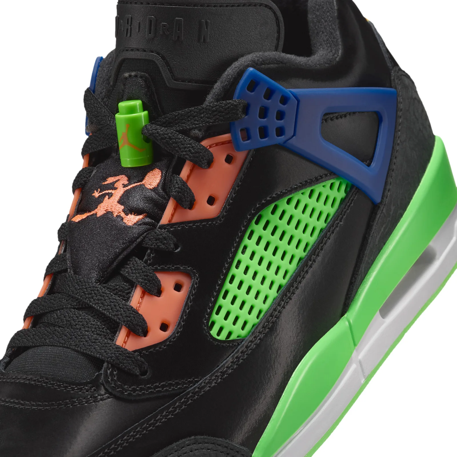 Detail of lacing area, green lace lock, orange Jumpman on tongue, blue cage and green mesh panel, Space Jam