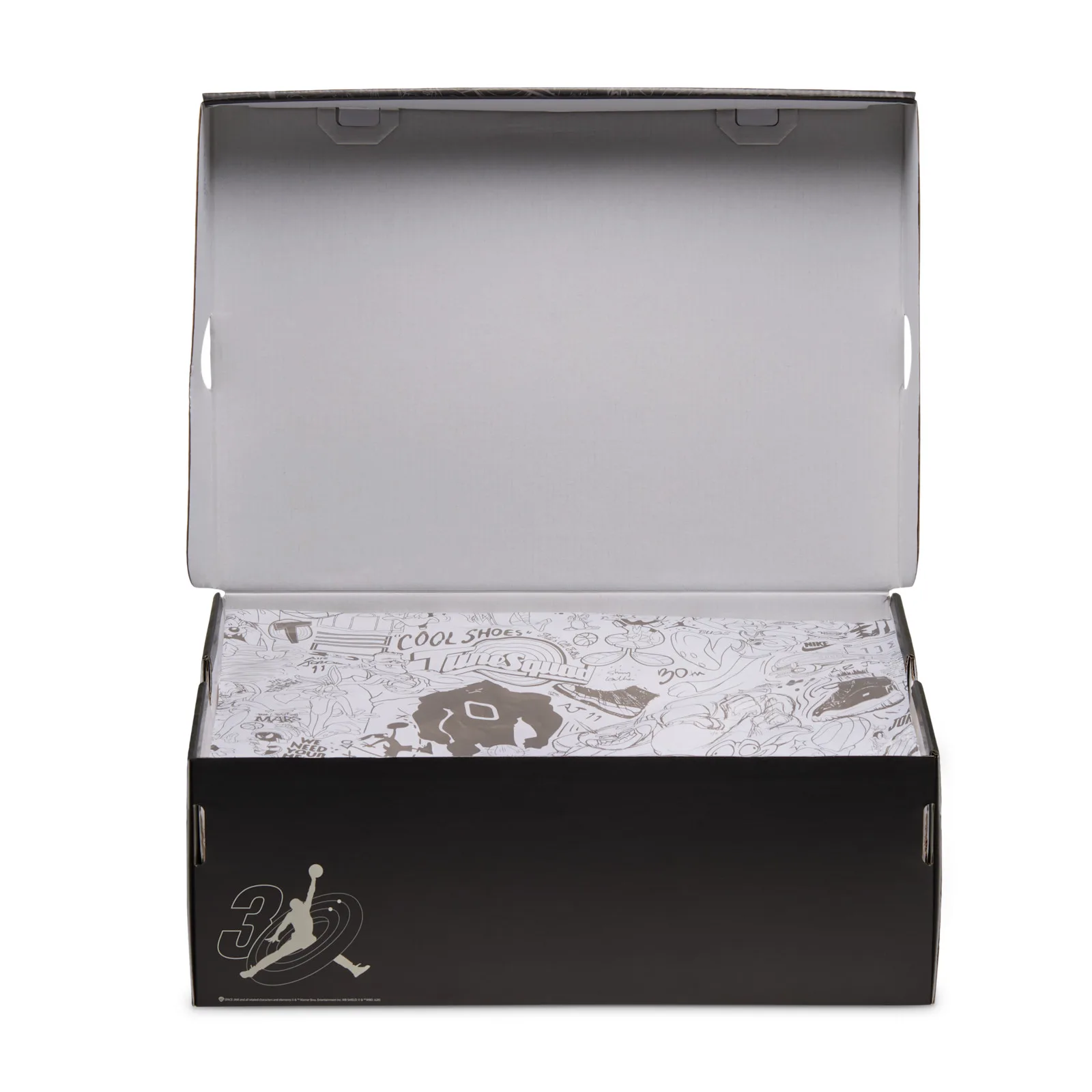 Open black shoebox with white tissue paper printed with sketched cartoon characters and Cool Shoes text, Space Jam