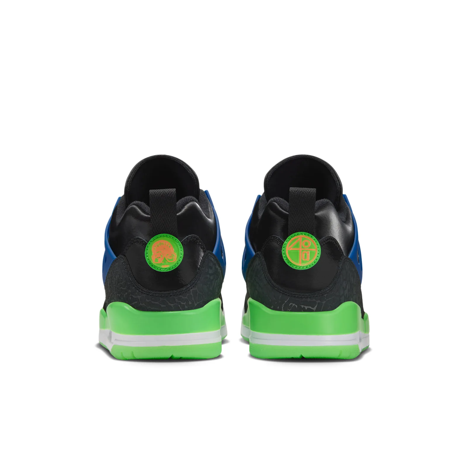 Heel view of pair, round green heel badges with orange logos, blue cage and neon green midsoles, Space Jam