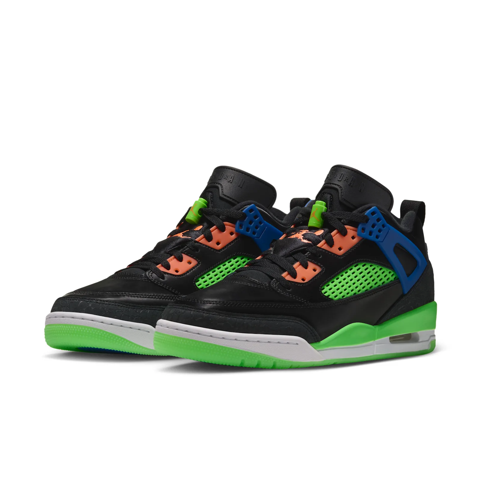 Pair at three-quarter angle, black uppers with orange eyelets, green mesh panels and neon green soles, Space Jam