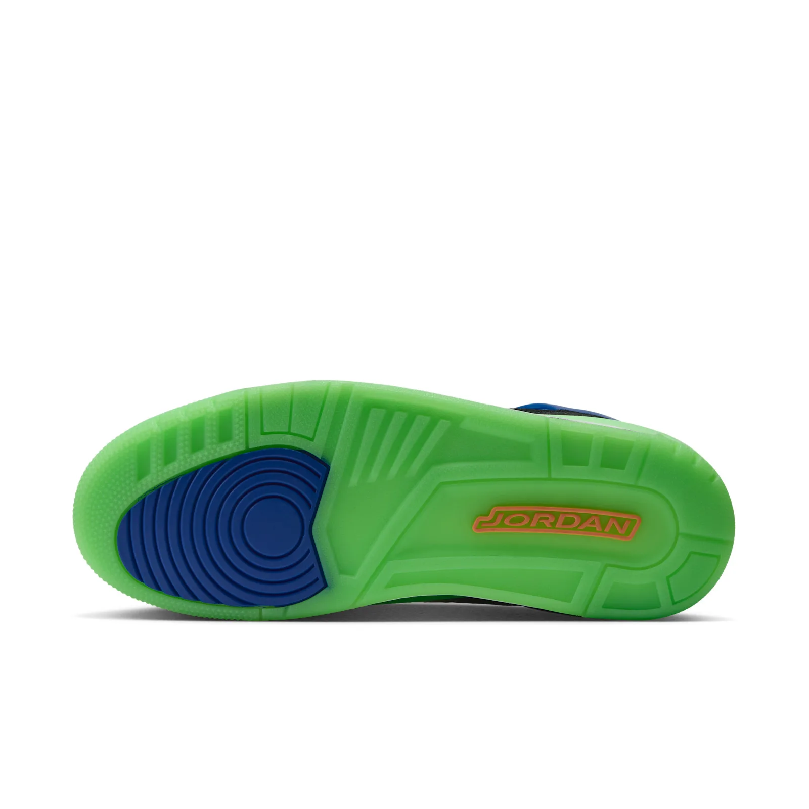 Outsole view, translucent neon green sole with blue circular pivot pattern and orange Jordan text, Space Jam