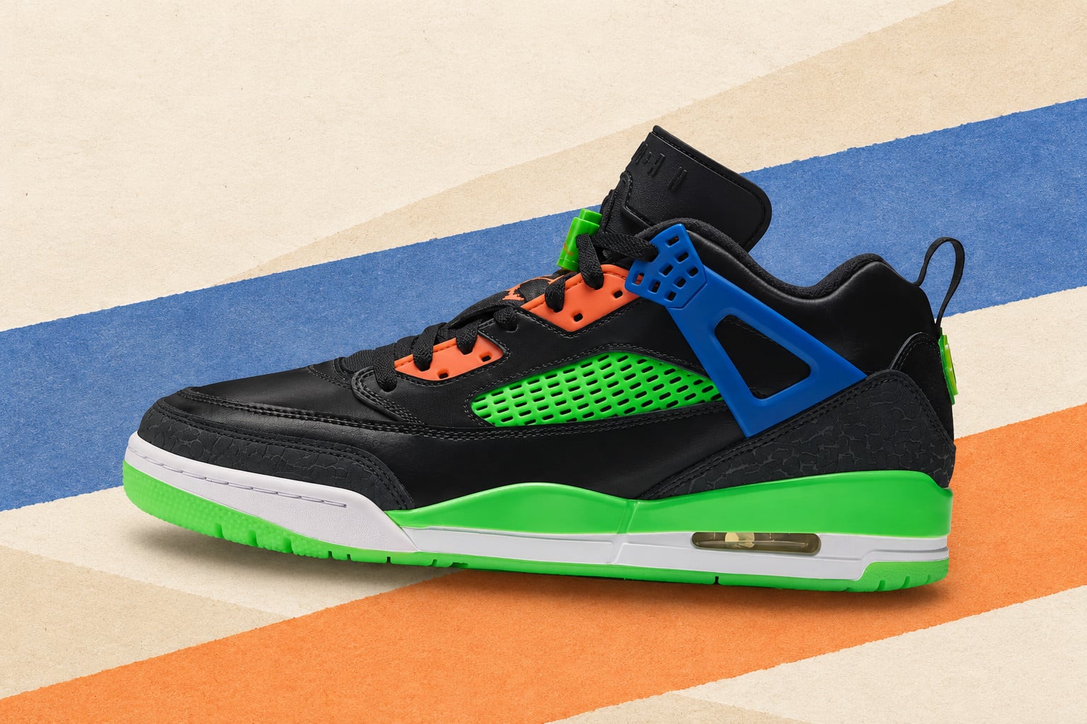 Lateral view on striped beige, blue and orange backdrop, black upper with neon green mesh, Jordan Spizike Low “Space Jam”