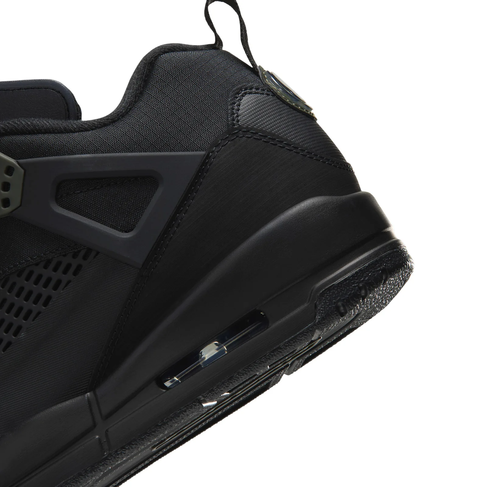 Detail of heel, black ripstop texture, visible air window and olive-rimmed heel badge on loop, Black
