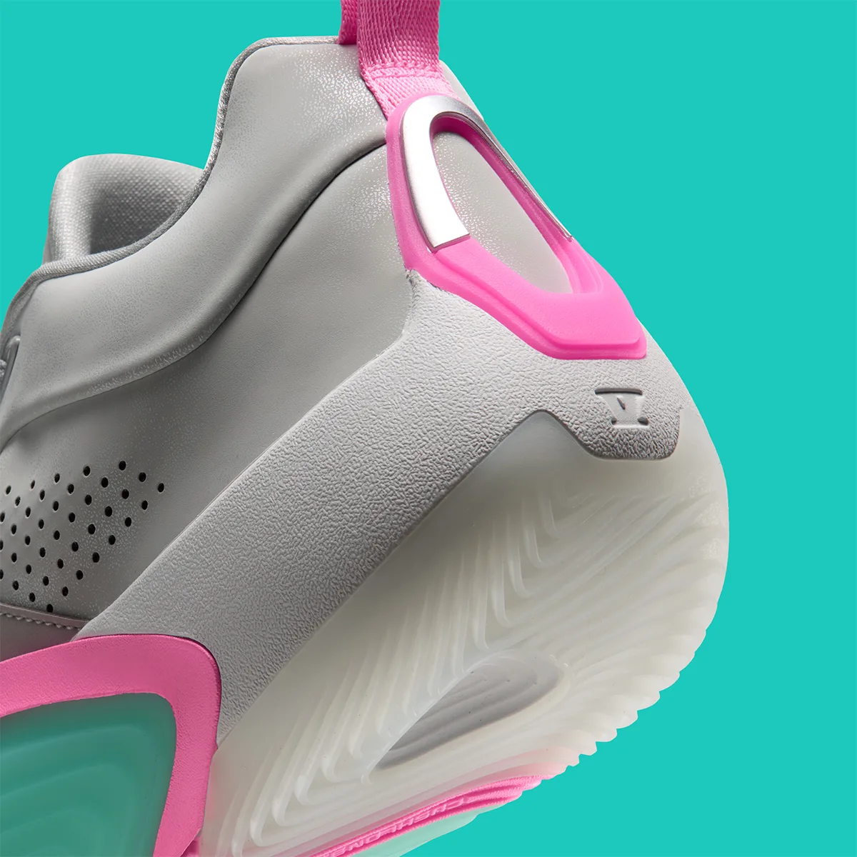 Detail of heel, pink and silver counter, textured grey midsole, translucent outsole edge, South Beach
