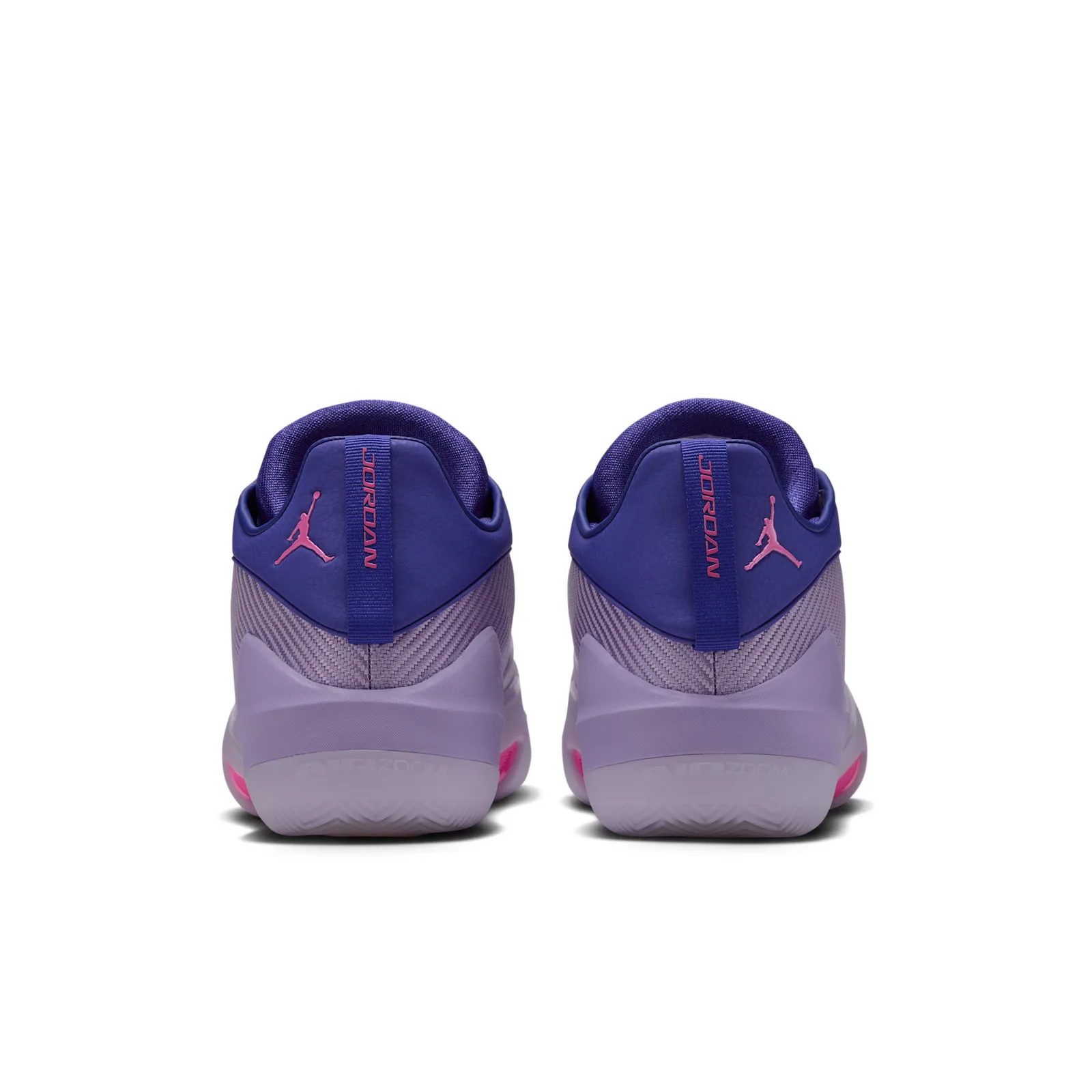 Heel view of a pair with pink Jumpman logos, vertical JORDAN heel straps and lilac heels with pink accents, Bright Concord