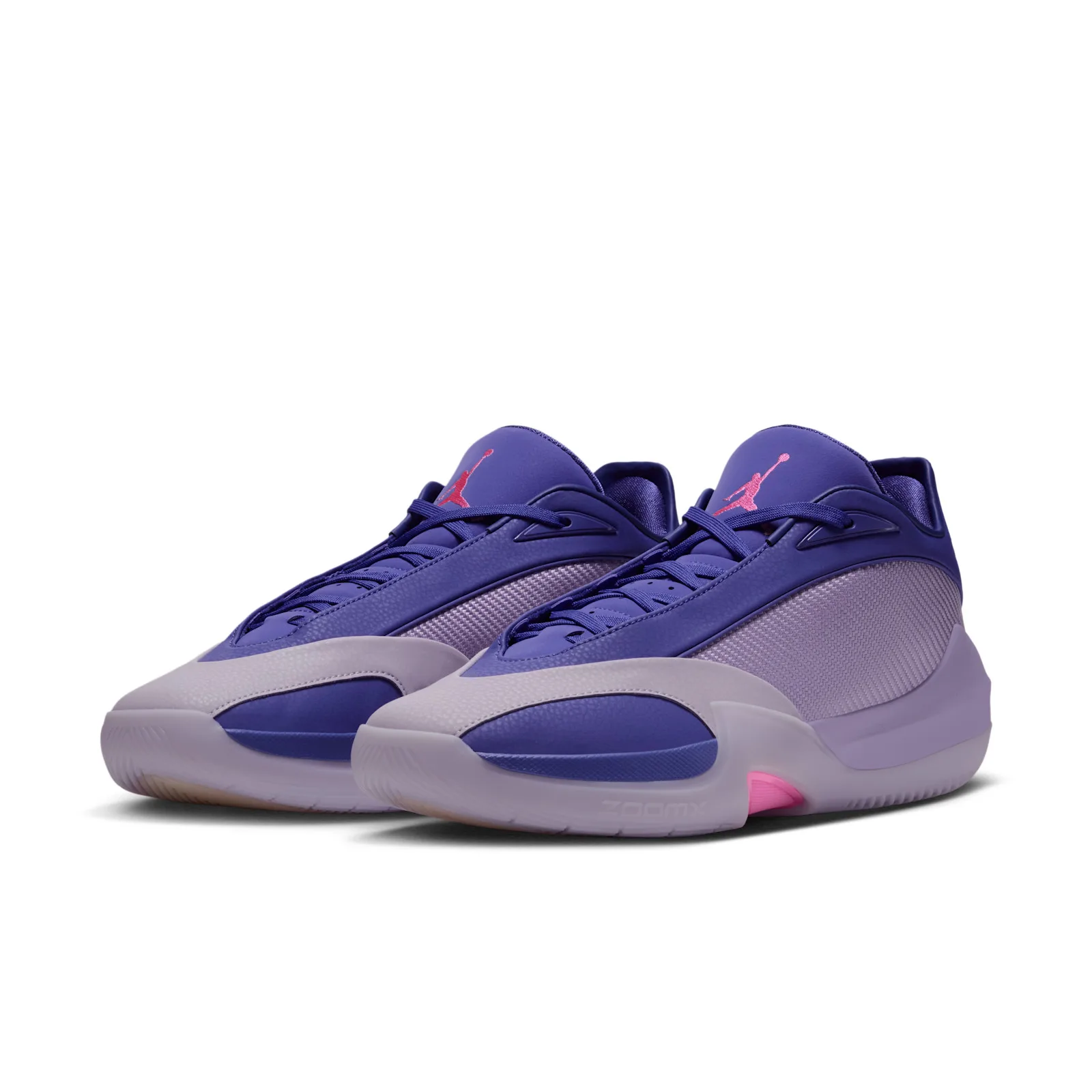 Pair at a three-quarter angle, purple uppers with lilac toe overlay, pink Jumpman on tongues and pink midsole accent, Bright