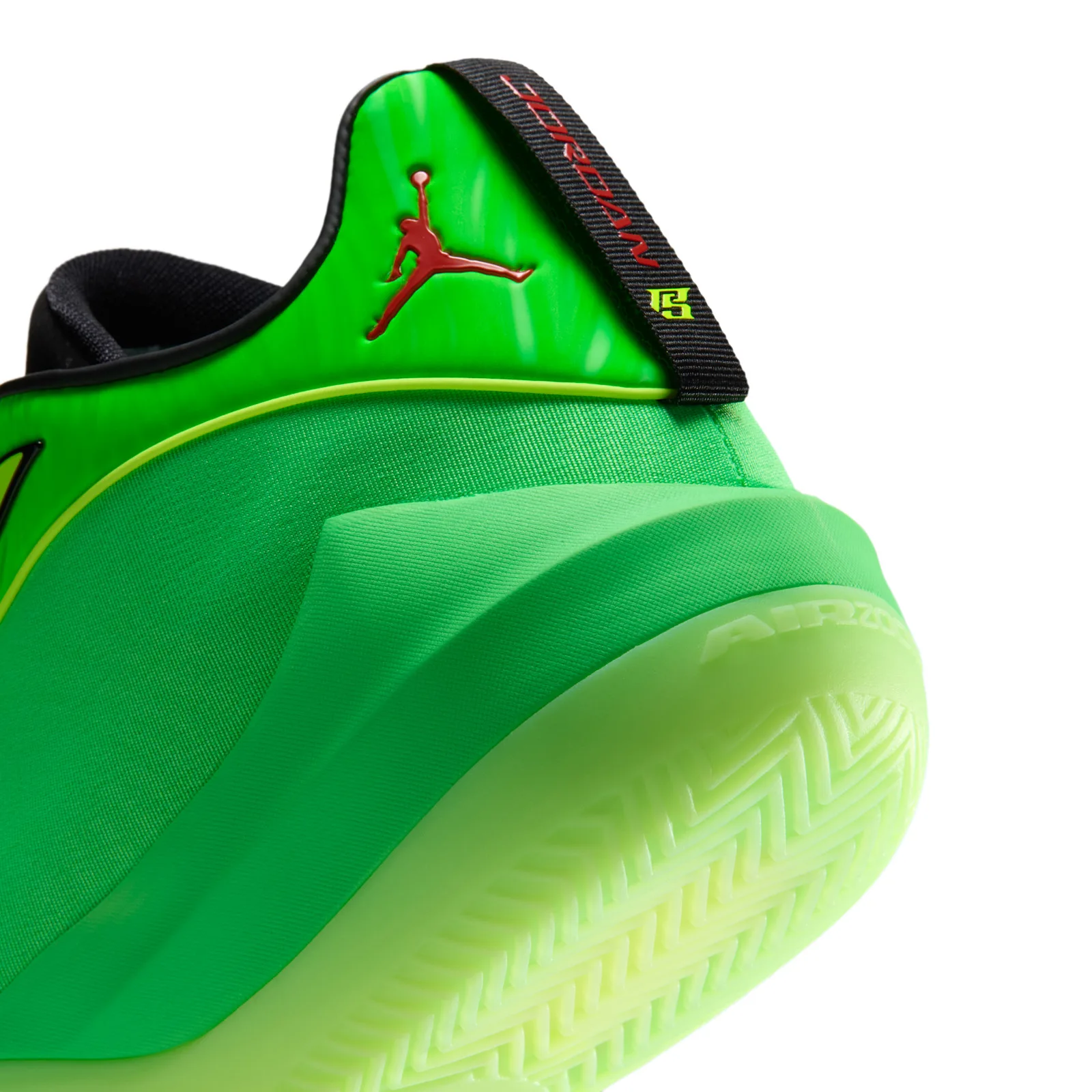 Detail of heel, red Jumpman on green panel, black JORDAN pull tab and lime traction sole, Paolo Banchero
