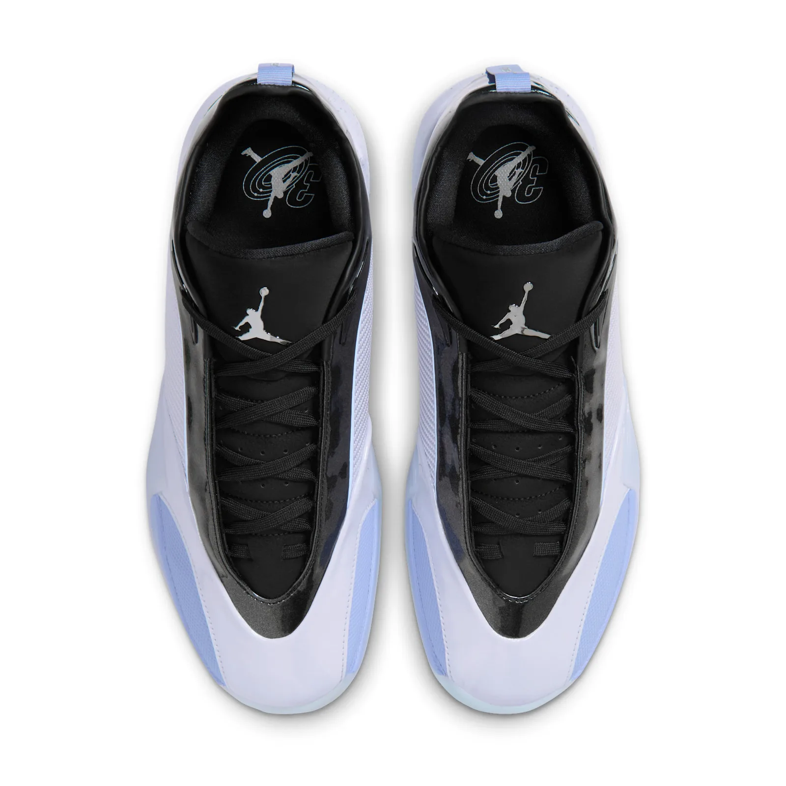 Top-down view of the pair, black laces, chrome Jumpman on tongues, insole graphic with a 3, Space Jam
