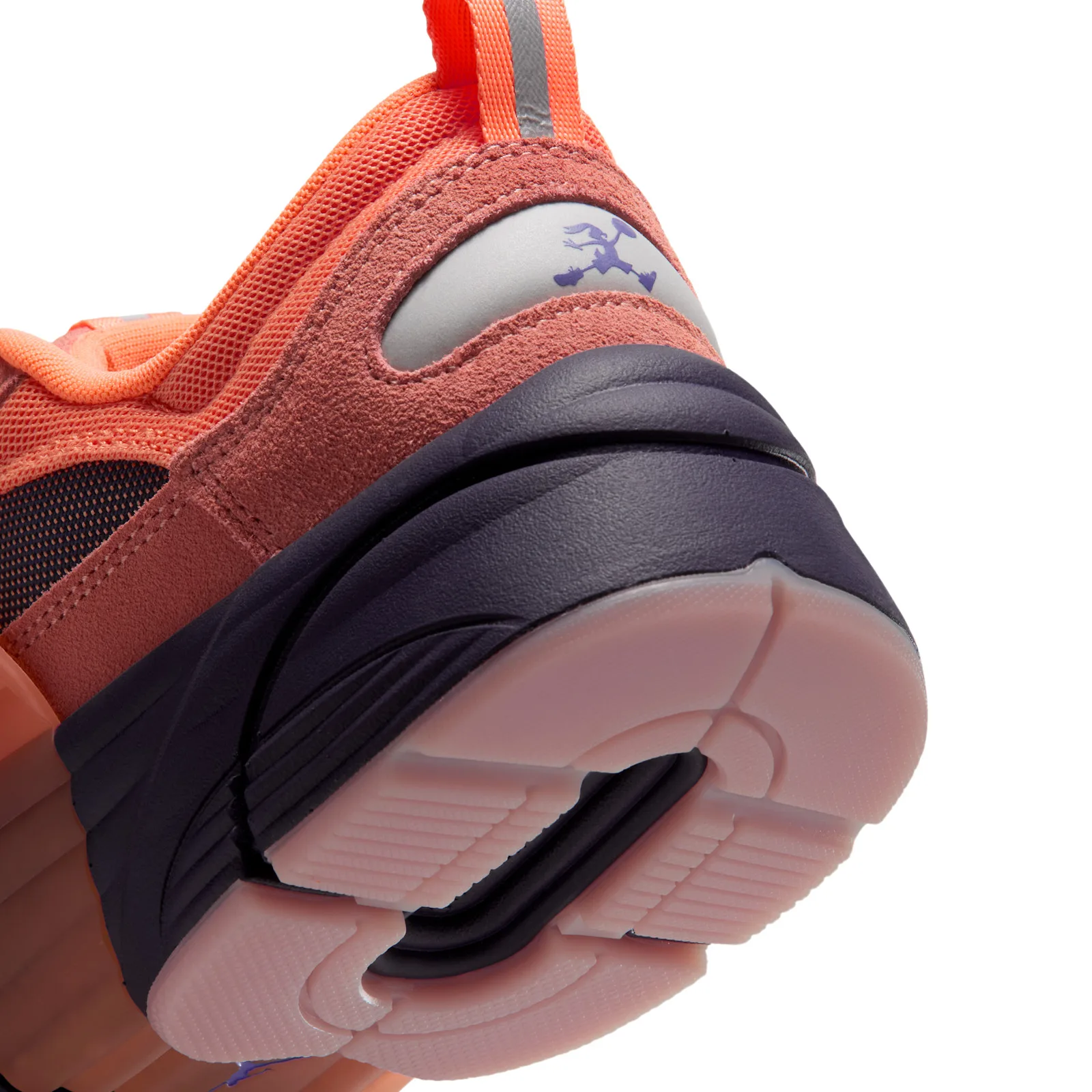 Detail of heel, purple cartoon rabbit logo on grey patch, coral suede, orange mesh, pink translucent outsole, Space Jam