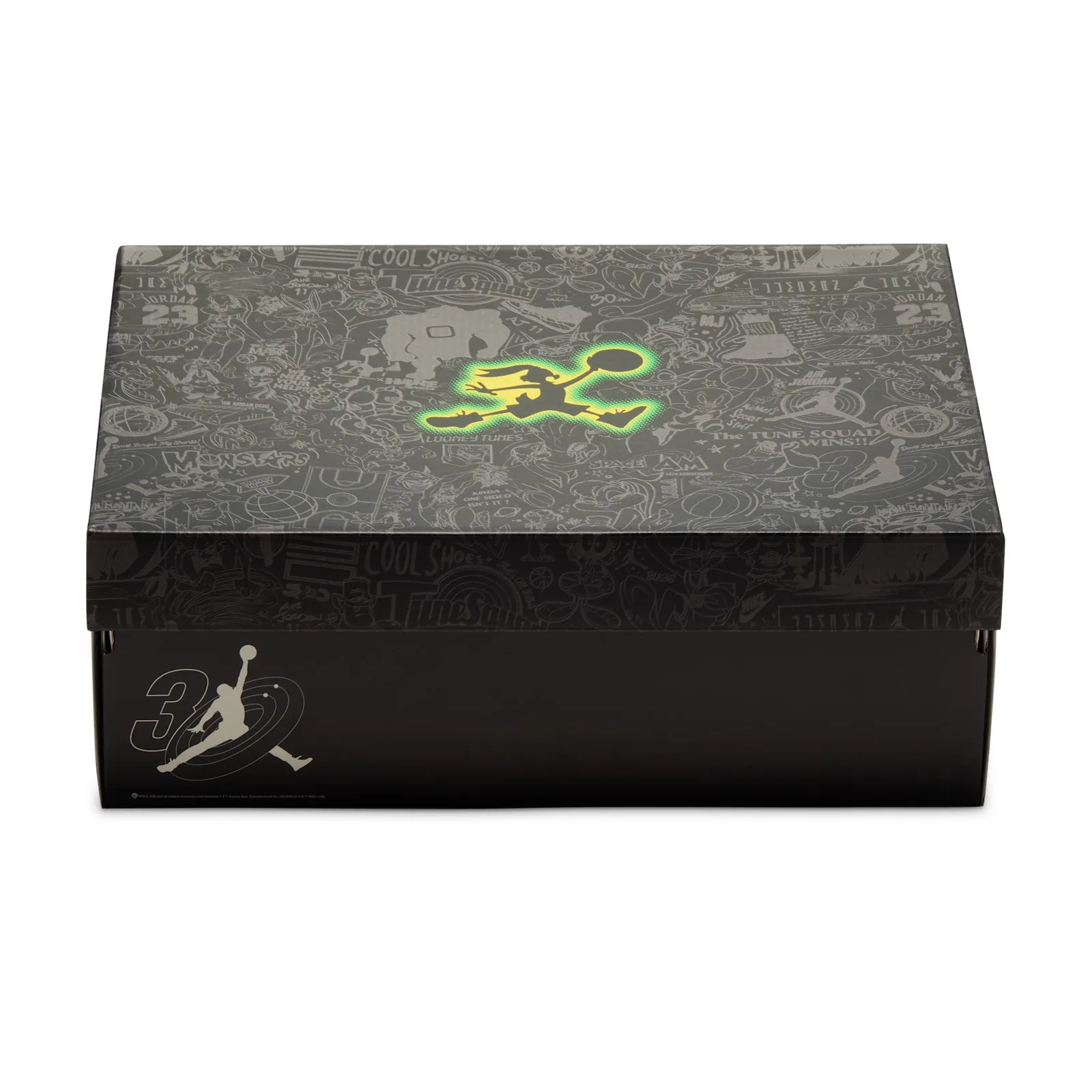 Packaging: black shoebox lid with grey cartoon doodle print and glowing green Jumpman rabbit logo, Space Jam Planet