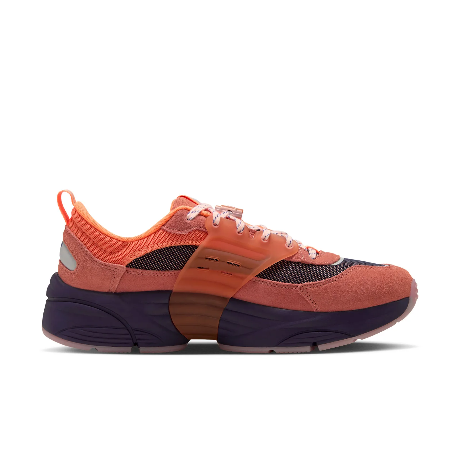 Medial view, orange heel pull tab, translucent orange strap, chunky purple midsole with pink outsole edge, Space Jam Planet