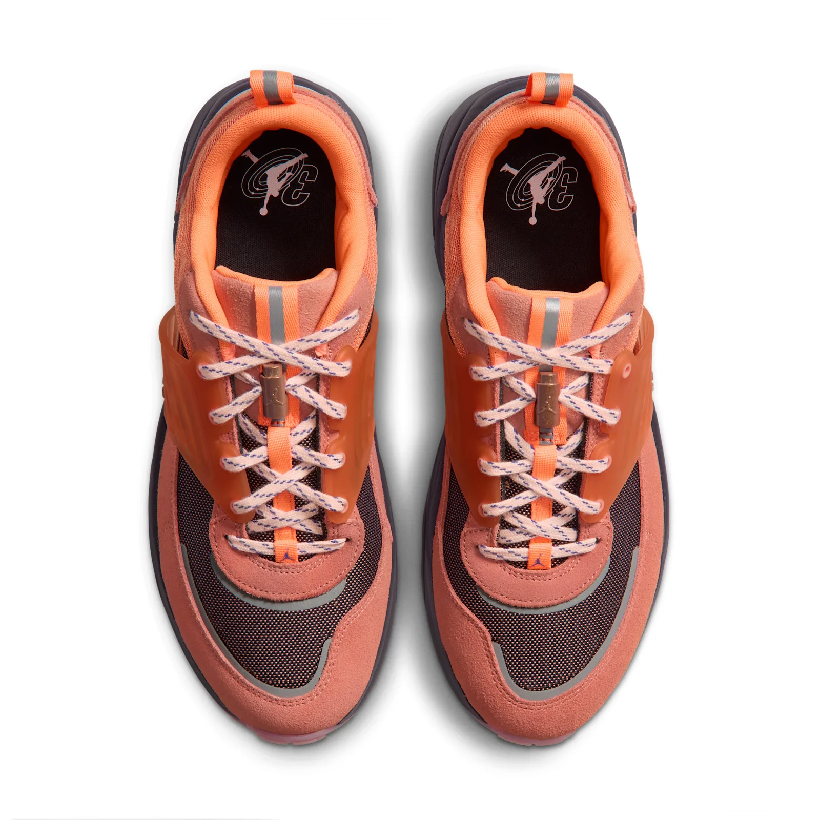 Top-down view of pair, cream laces with blue flecks, orange strap, copper lace toggle, 3 logo on insoles, Space Jam Planet