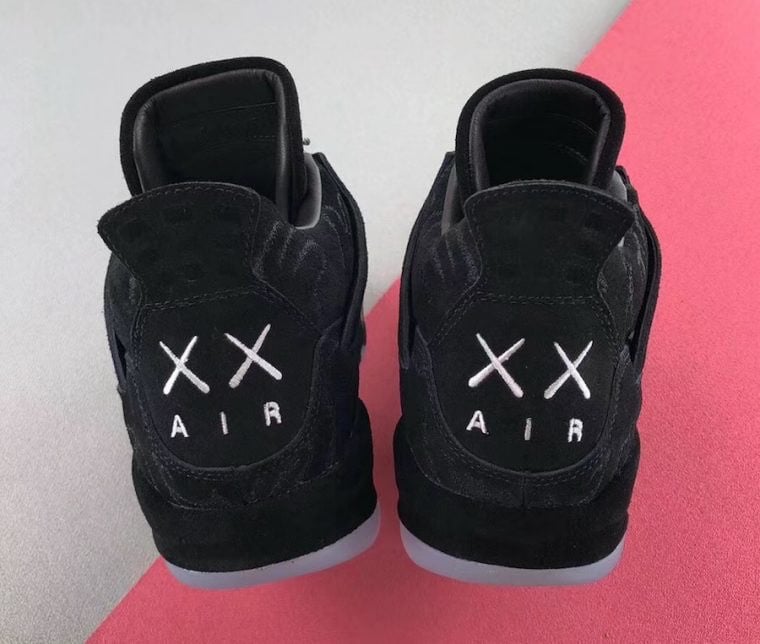 Heel view of two black suede sneakers with white XX and AIR embroidery, icy soles, Dark Grey