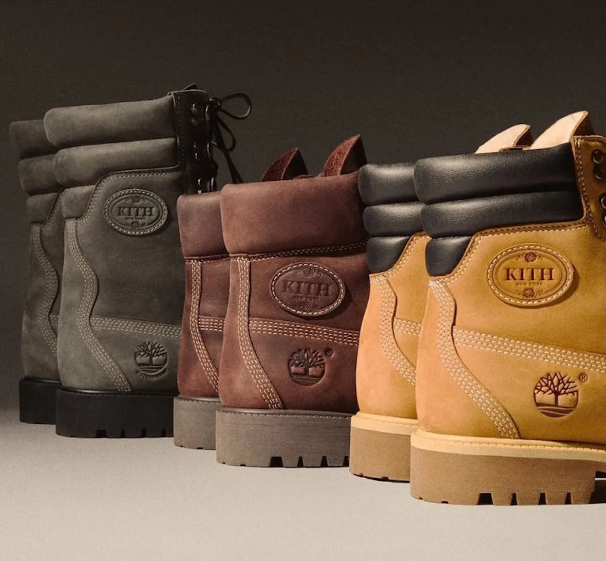 Heel view of grey, brown and wheat boots with Kith ovals and tree logos, Wheat