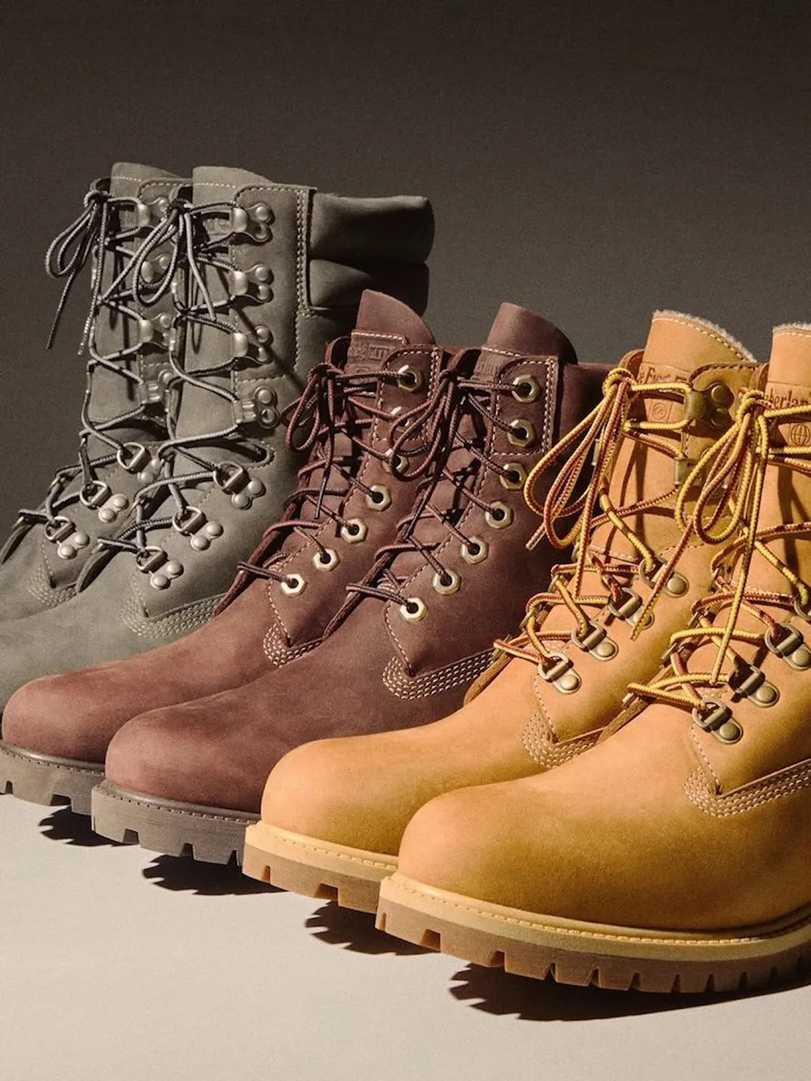 Top-down toe view of grey, brown and wheat boots with laces and metal eyelets, Wheat