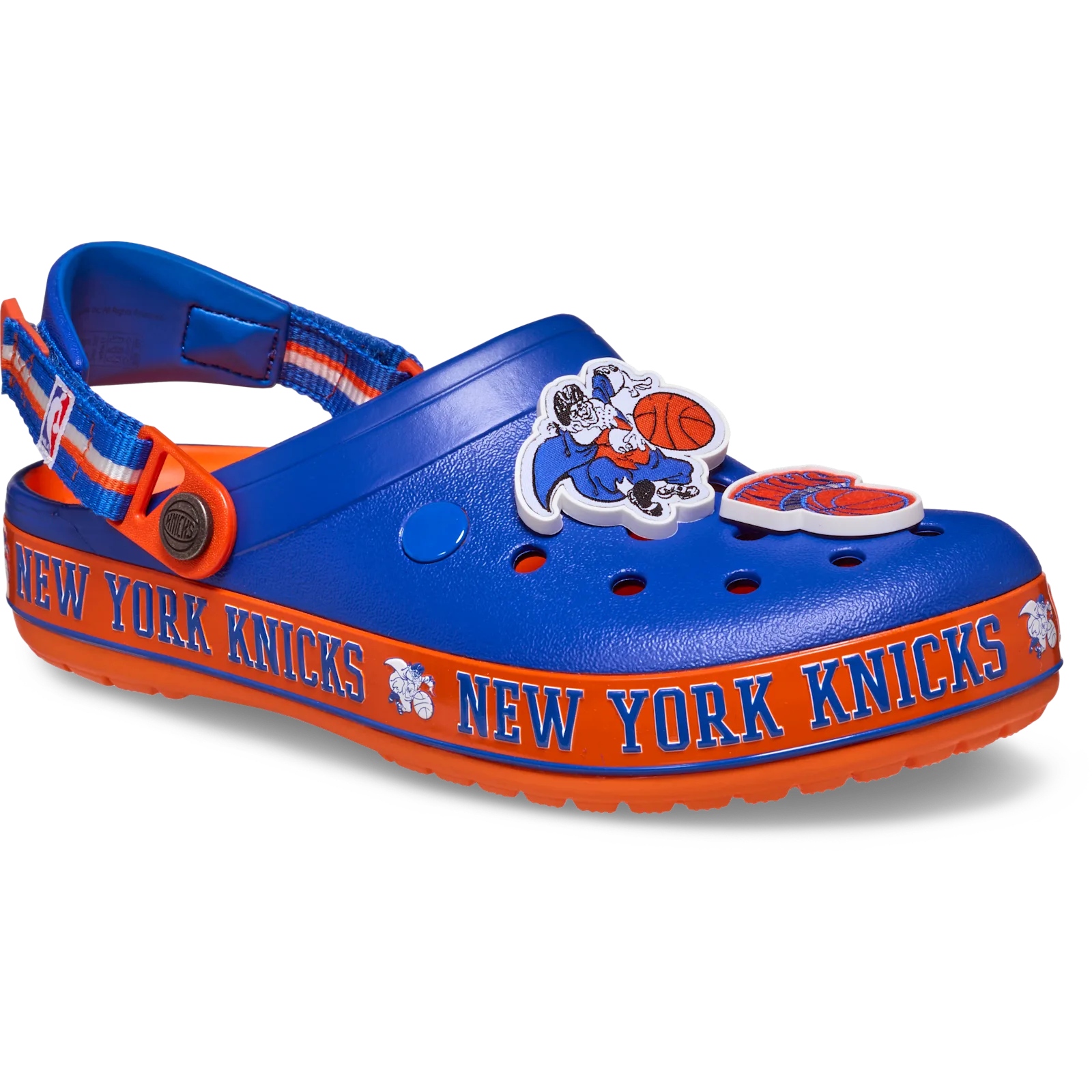 Three-quarter view of blue clog with orange New York Knicks band and two charms, Crocband Clog Collection