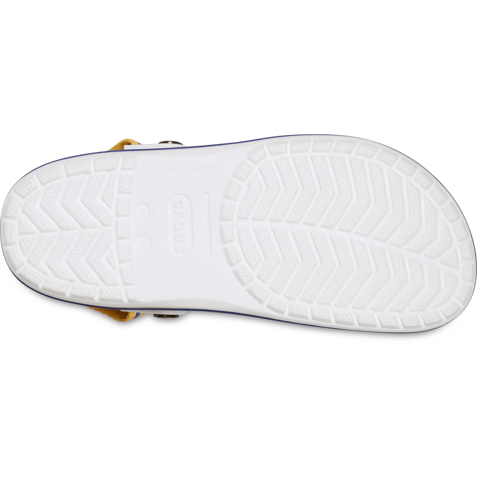 Outsole of white clog with chevron tread, navy edge and yellow strap visible, Crocband Clog Collection