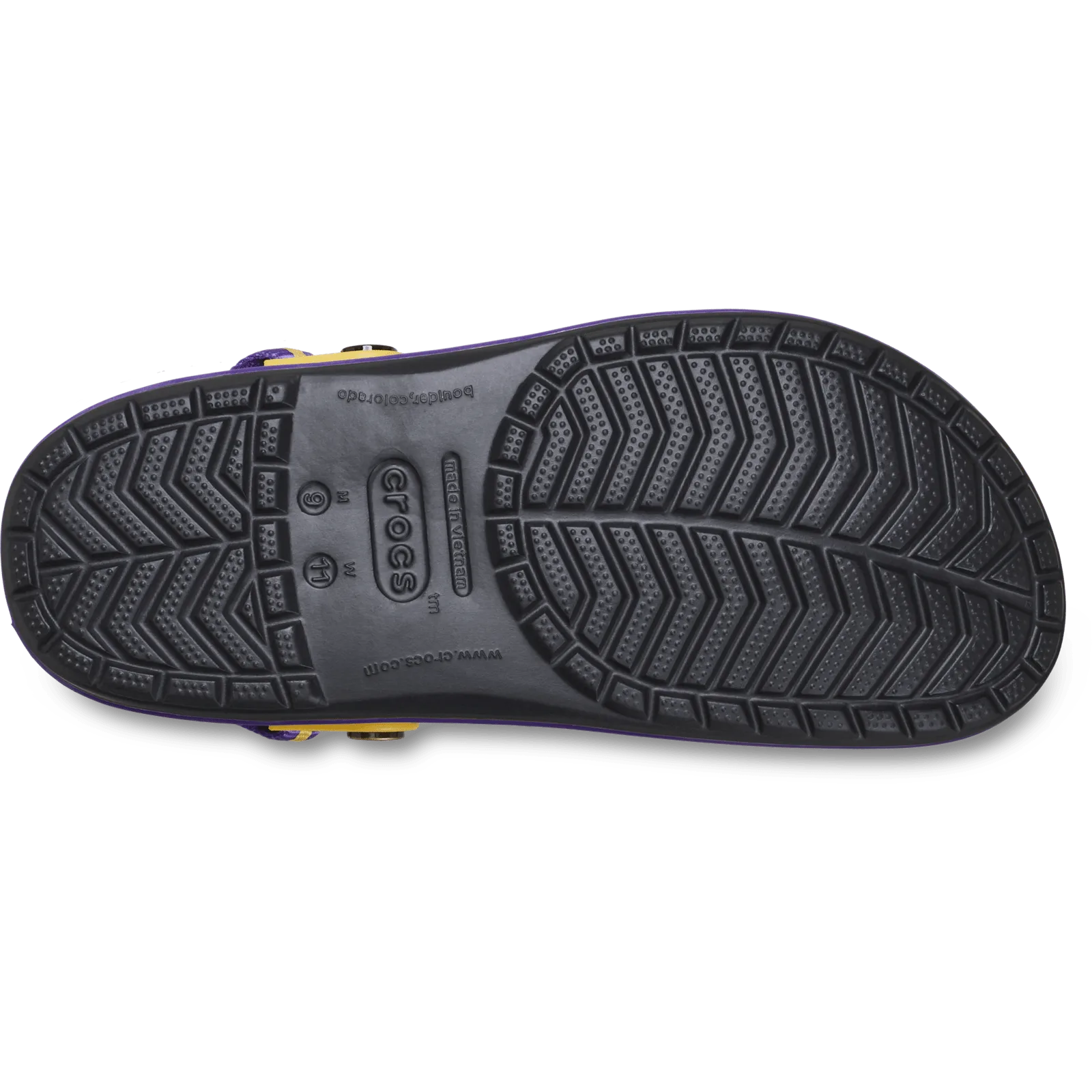 Outsole of black clog with chevron tread, crocs logo and purple edge, Crocband Clog Collection