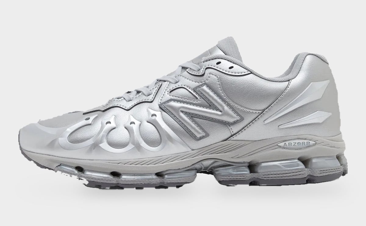 Lateral view in metallic silver with ABZORB text on the midsole and clear heel pods, Liquid Metal
