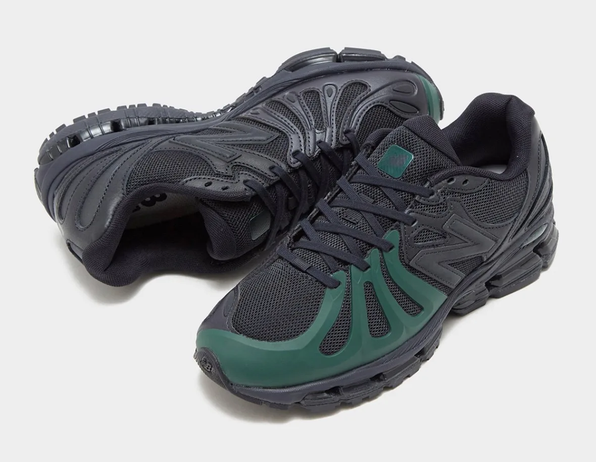 Black sneaker with green toe cage beside the second shoe tilted to show its upper and inside, Brown/Navy