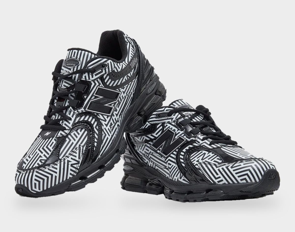 Pair angled view from the front, black laces, N logos and black outsoles on a grey background, Dazzle Camo