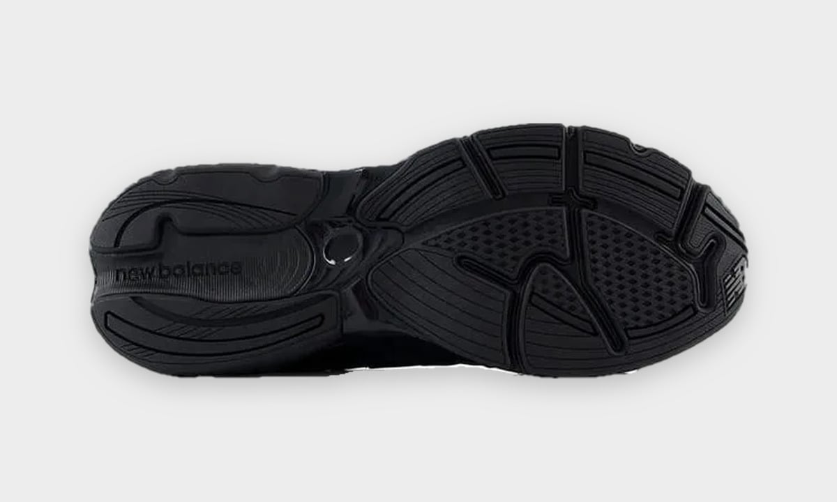 Outsole view in black rubber with new balance text at heel and textured forefoot tread, Black/Field Green