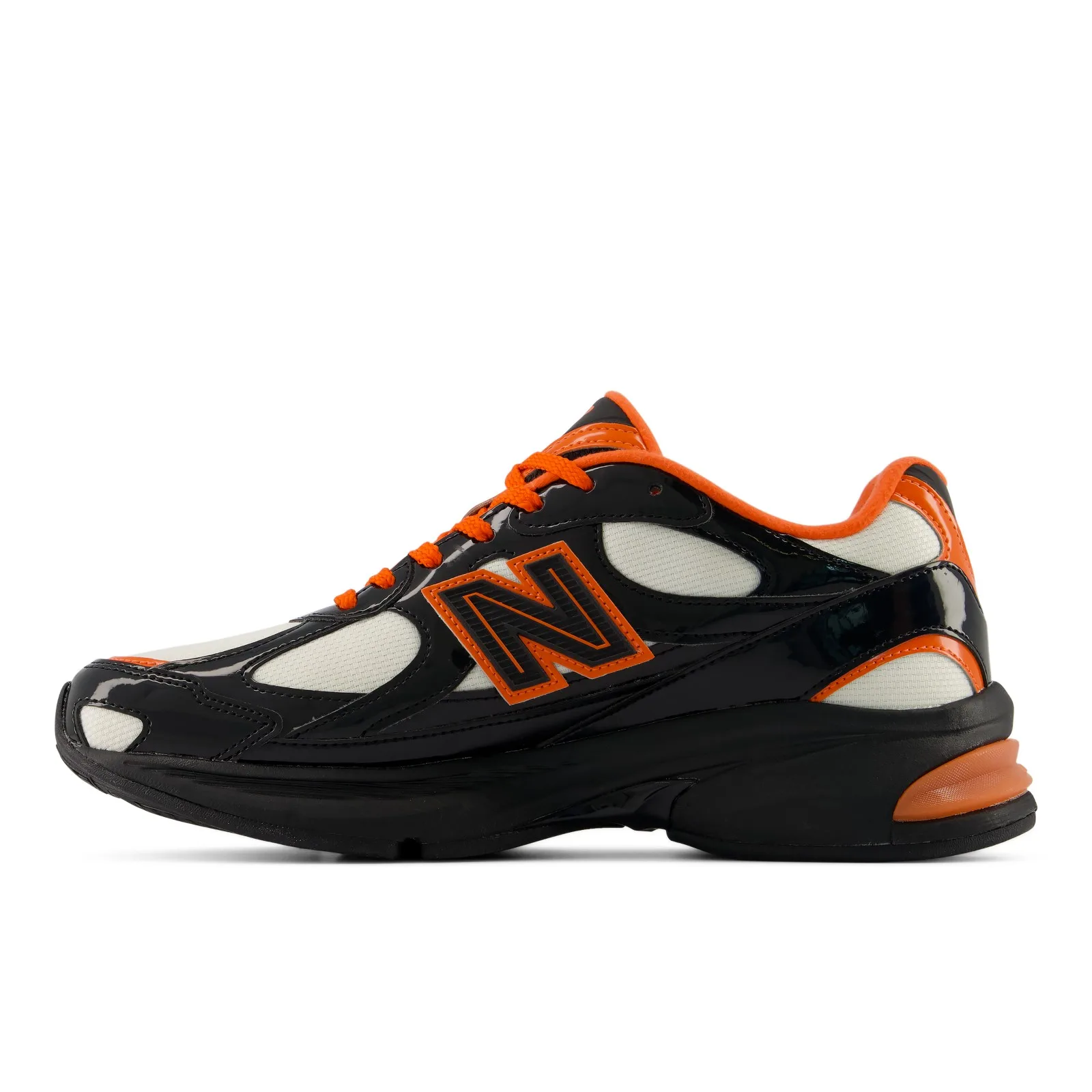 Medial view, orange N logo, orange laces and heel pod on black patent upper, Halloween