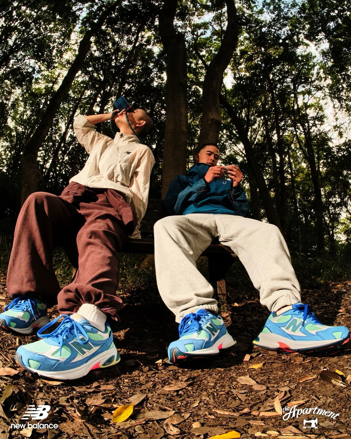 On-foot woodland view of blue and mint trainers, with logos along the bottom, Kingfisher