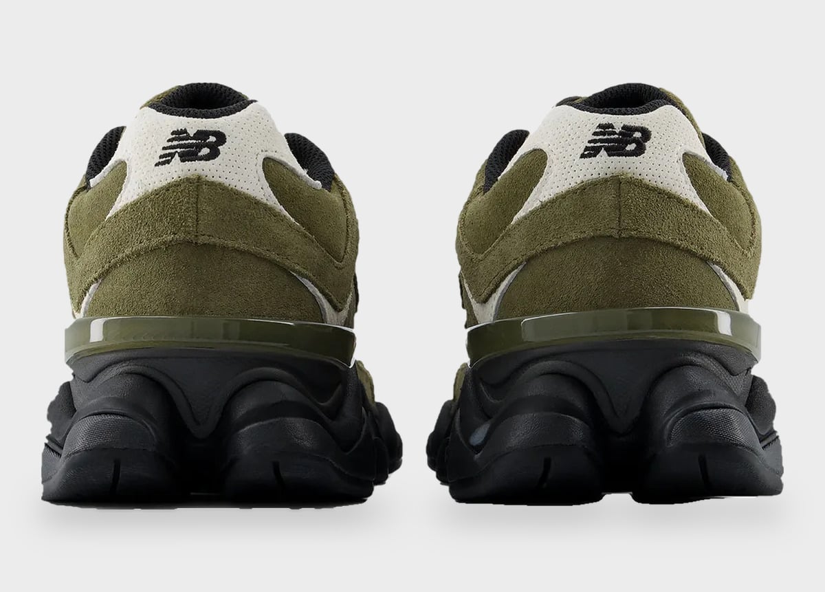 Heel view of olive suede pair with New Balance logo on cream heel tab and black sole, Balance 9060 Trail