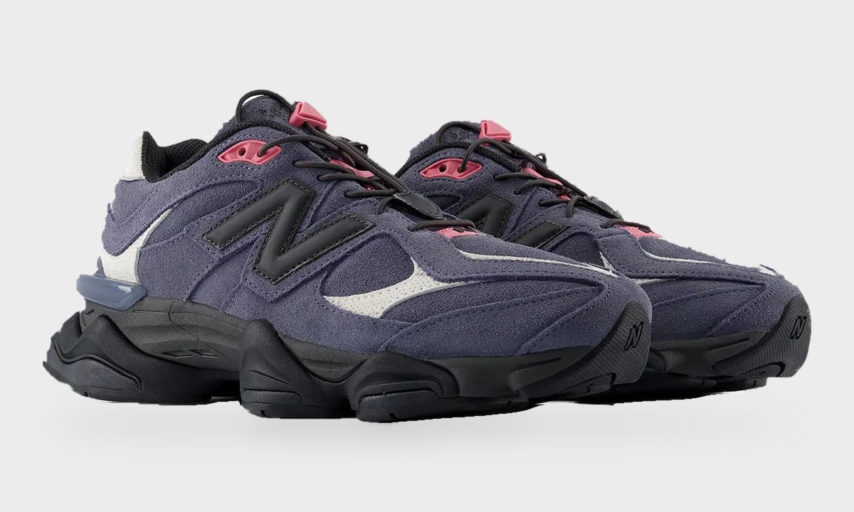 Pair at three-quarter angle, navy suede with pink lace toggle and black N logo, Balance 9060 Trail