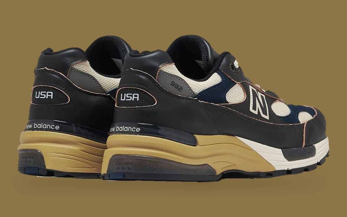 Pair from the heel on tan background, USA heel patches, new balance text and tan midsole, Afterglow