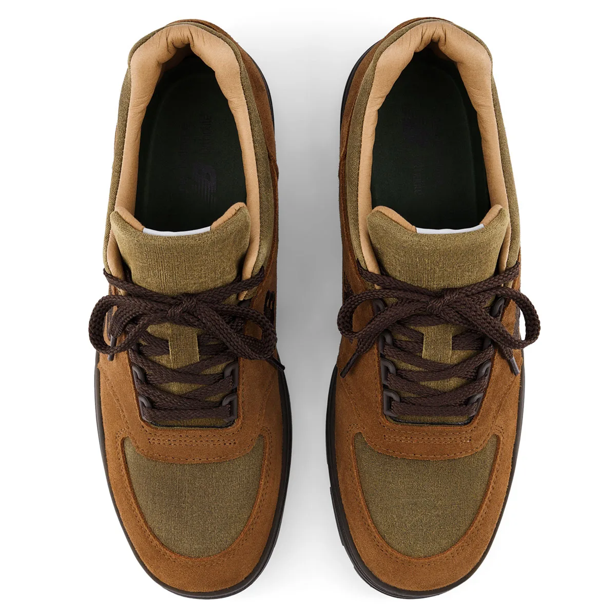 Top-down view of pair with brown laces, tan collar lining and olive canvas toe panels, Moorland Textures