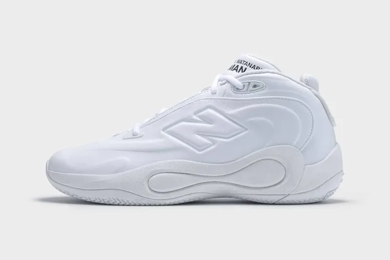 Lateral view of an all-white leather mid-top with a raised N logo and a wavy sculpted midsole, Watanabe MAN P400