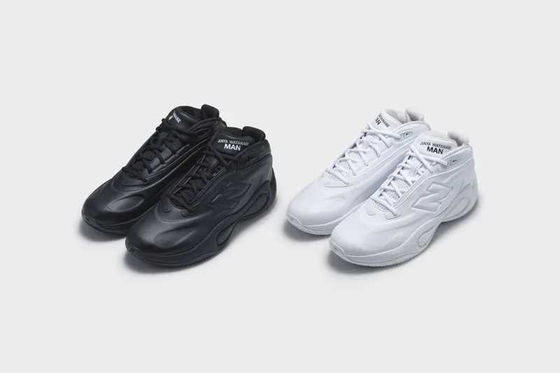 Pair of black and white mid-top sneakers, side by side, with Junya Watanabe MAN text, New Balance x Junya Watanabe MAN P400