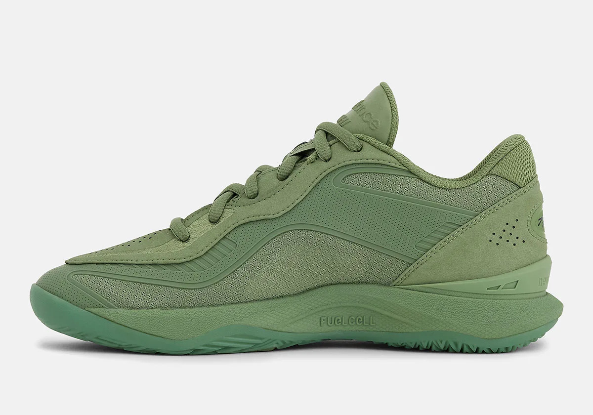 Medial view of green shoe with FUELCELL text on midsole, perforated suede heel and mint outsole, Balance Kawhi 5