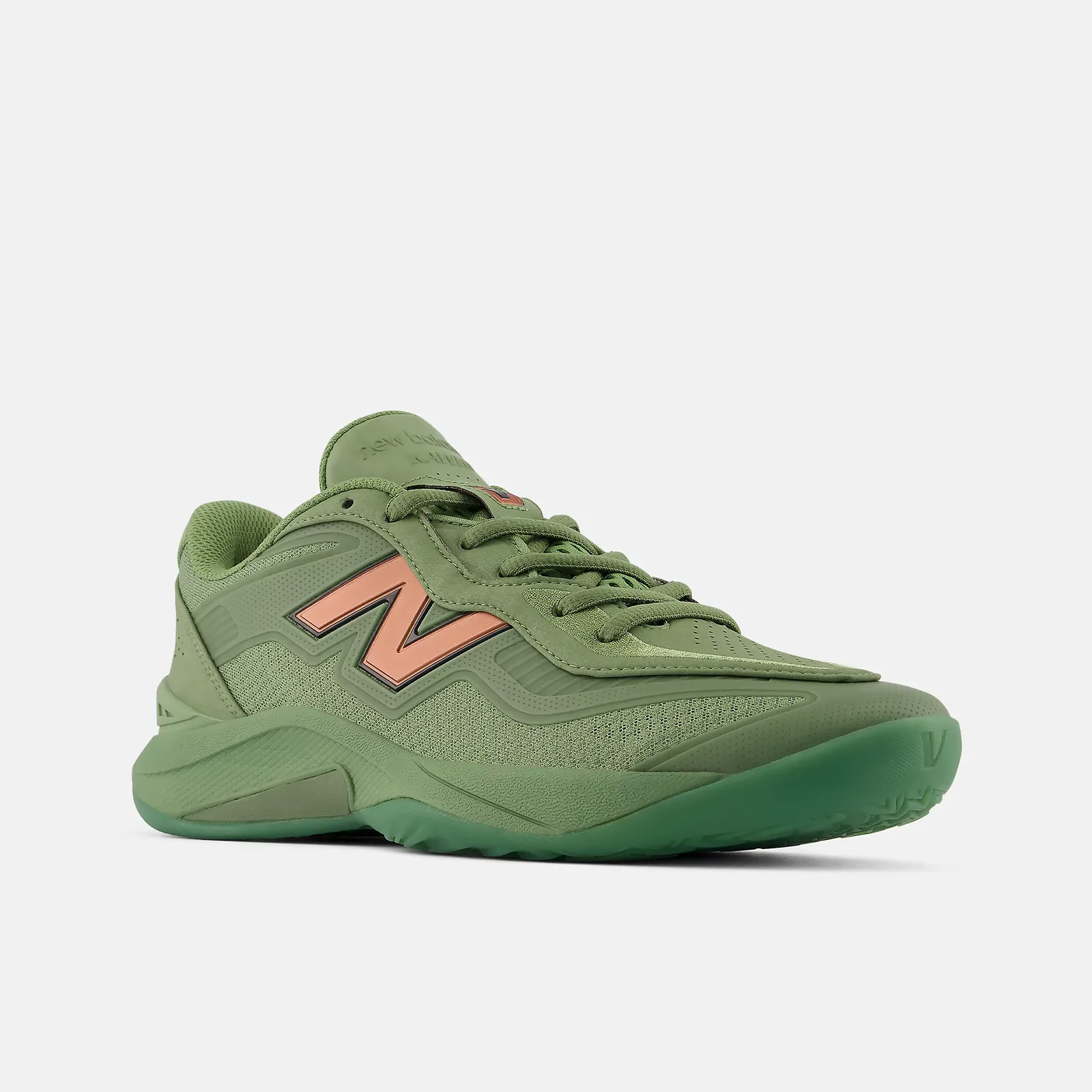 Three-quarter front view of all-green shoe with copper-orange N logo and translucent green midsole, Oregano