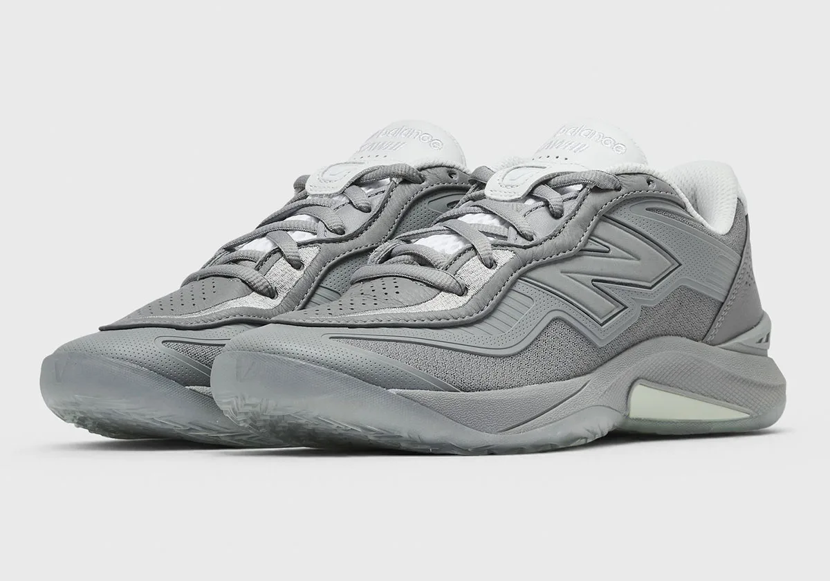 Pair at three-quarter front angle, grey laces, white tongues and large N logos, Slate Grey
