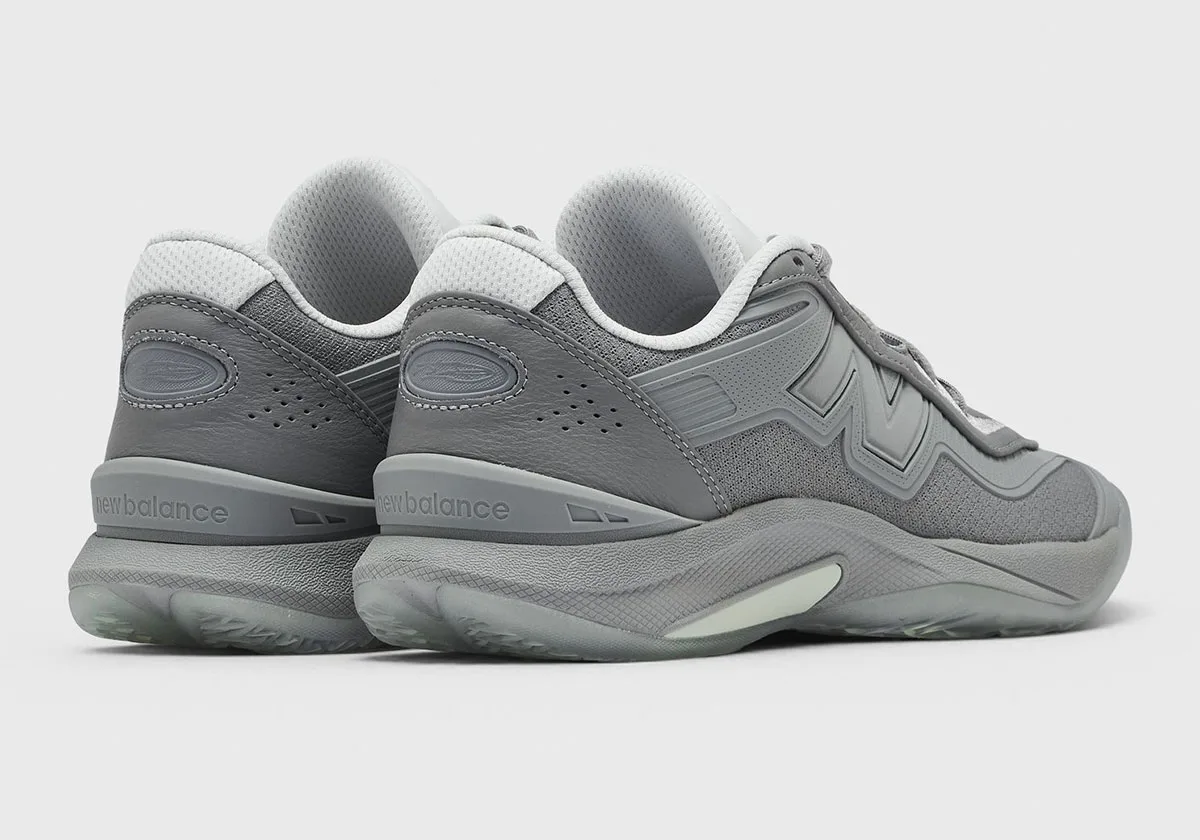 Pair from the heel and side, grey leather heels with perforations and new balance text, Slate Grey