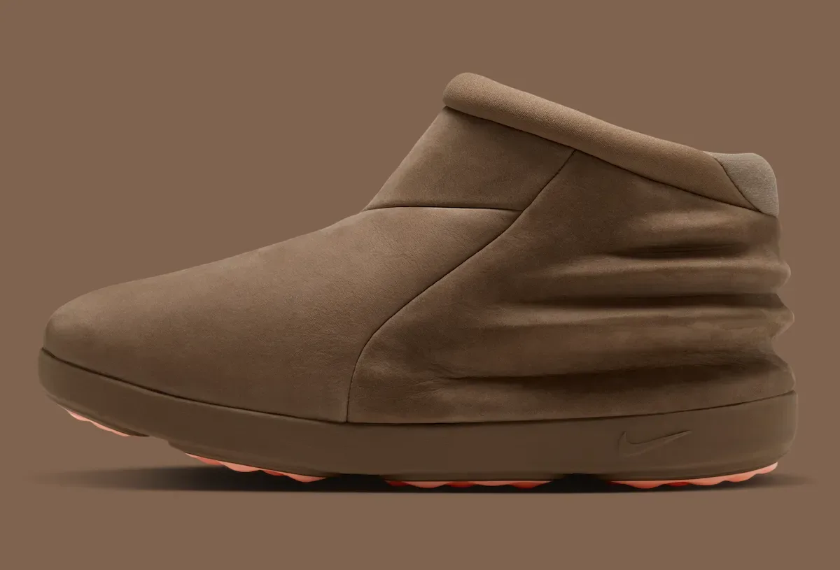Medial view of brown nubuck boot with ruched heel, swoosh on midsole, pink sole, Dark Driftwood