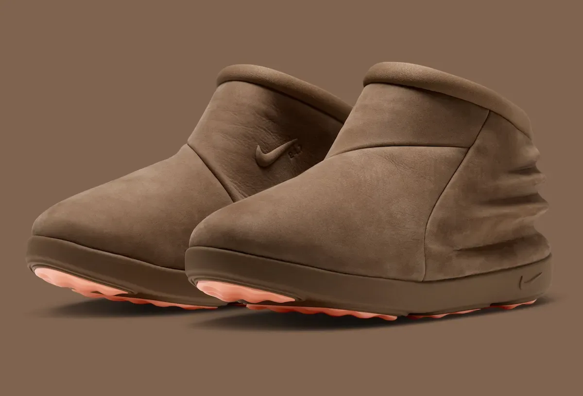 Pair in three-quarter view, brown nubuck with Nike swoosh and pink dimpled soles, Dark Driftwood